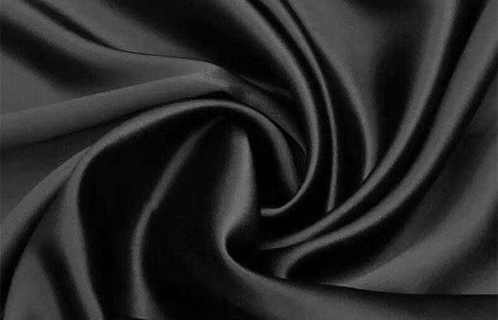 Black dyed acetate satin fabric