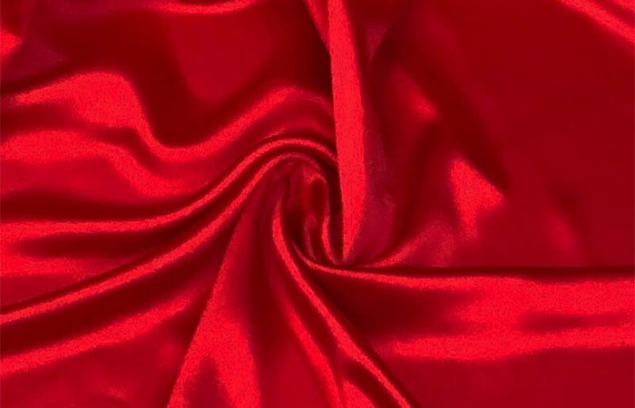 Bright red dyed acetate fabric