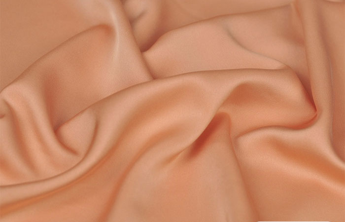 Living coral acetate satin fabric