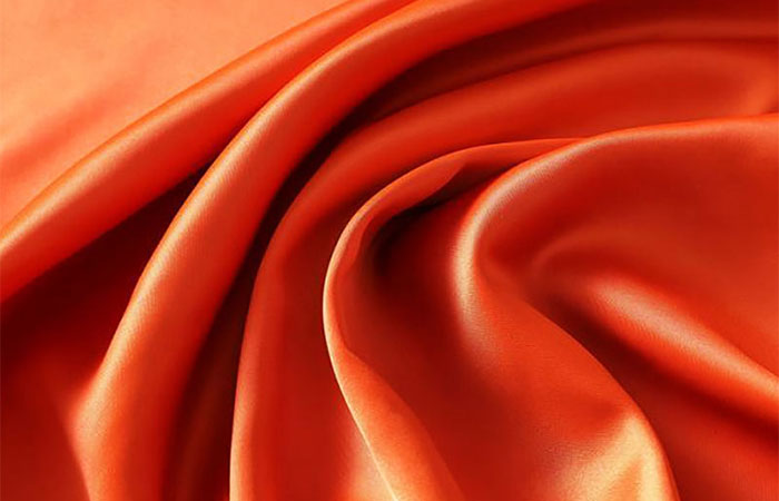 Orange acetate satin fabric